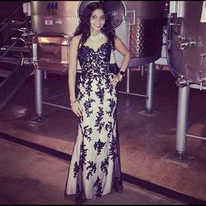 Black lace fitted formal gown.